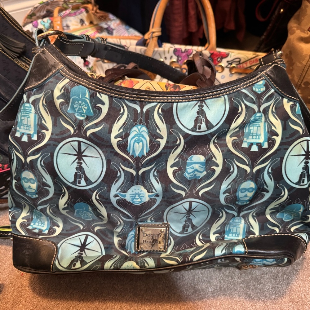 Dooney & Bourke Teal and Black Star Wars Pattern Hobo